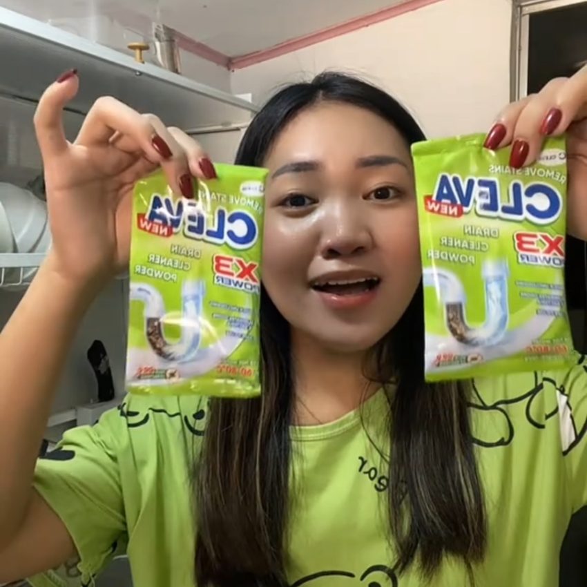 Customer showing CLEVA Drain Cleaner Powder sachets